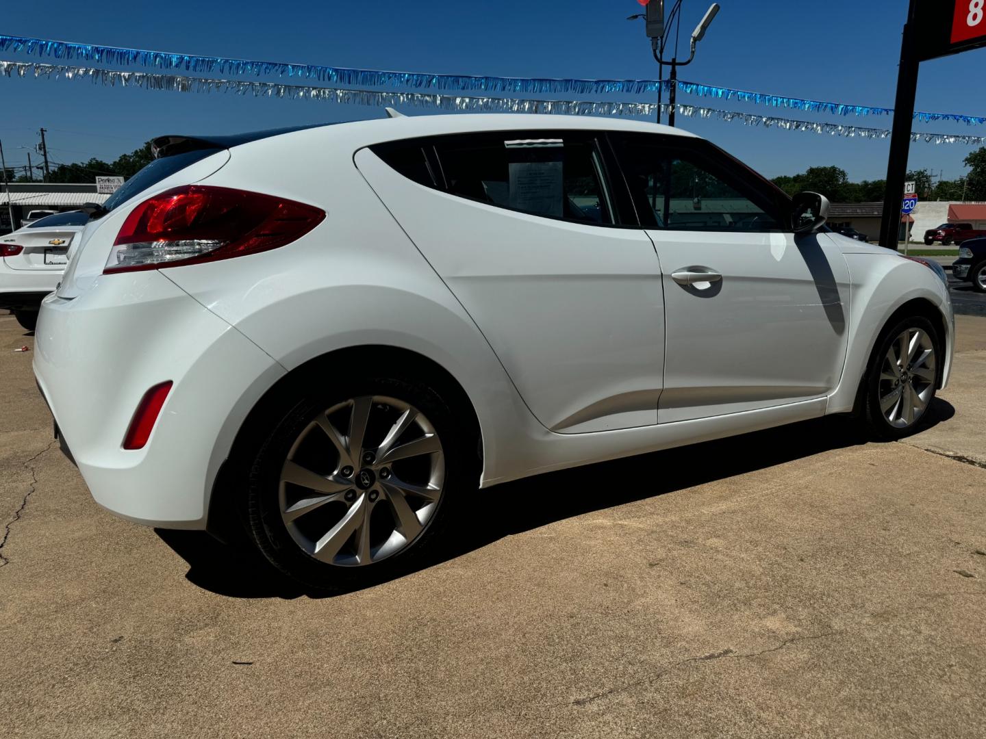 2016 WHITE /Gray HYUNDAI VELOSTER Base 3dr Coupe (KMHTC6AD7GU) with an 1.6L I4 engine, Automatic 6-Speed transmission, located at 5900 E. Lancaster Ave., Fort Worth, TX, 76112, (817) 457-5456, 0.000000, 0.000000 - This is a 2016 Hyundai Veloster Base 3dr Coupe that is in excellent condition. There are no dents or scratches. The interior is clean with no rips or tears or stains. All power windows, door locks and seats. Ice cold AC for those hot Texas summer days. It is equipped with a CD player, AM/FM radio, A - Photo#4